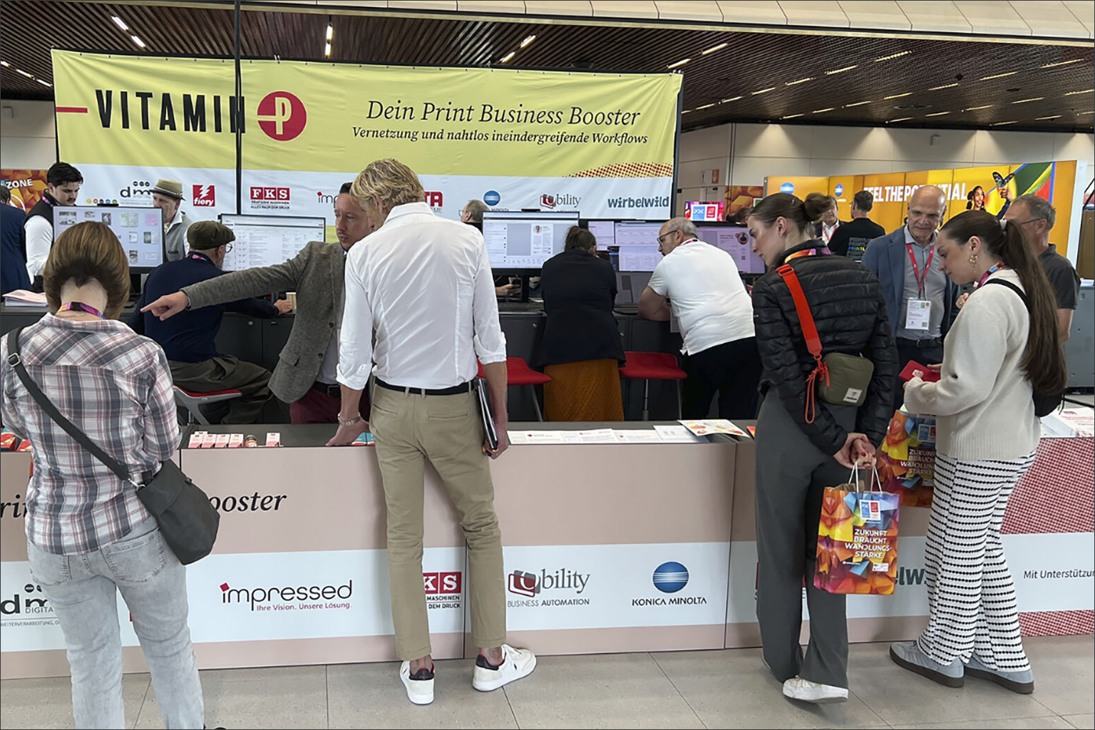Das Bild zeigt den Stand der Vitamin-P-Initiative auf der Print Digitial Convention. Impressed war dabei.